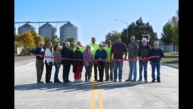 Attending the Ribbon Cutting ceremony were: Hulstein Project Manager Jay Hartley and KLJ Engineering Technician Bruce Struckman; Golden West, Membership Associate Jody Bielmaier; E Free Church Pastor Chris Clark; City Council Members, Rick Hustead and Stan Anderson; Jessica Kusser; Wall Economic Development Director, Rochan Burrell; Wall Chamber Board Director, Wayne Shull; Wall City Finance Officer, Carolynn Anderson; and Wall Public Works Department-Garrett Bryan, Trevor Frick and Gary Vernon. Courtesy Kim Handcock