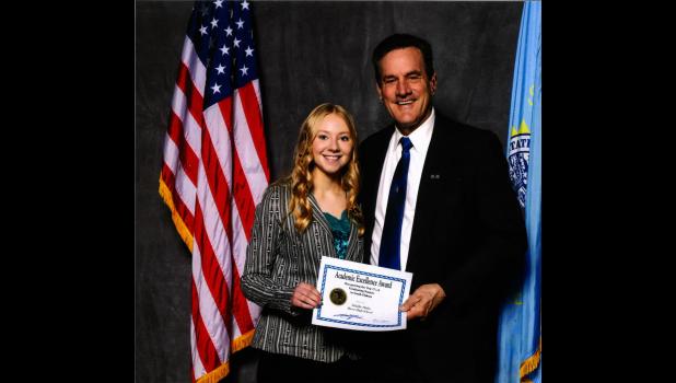 Maddie Hulm, Bison High School with Lieutenant Governor Larry Rhoden.