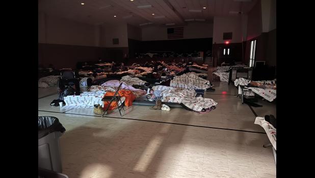 Cots were lined up with stranded motorists in the Wall Community Center. photo courtesy Pennington County Sheriff’s Office