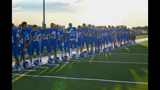 The Wall Eagles place their hands over their hearts before the start of Friday nights games. Photo Courtesy Kim Handcock