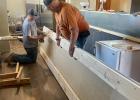 The late-night shipment of the counter tops, made for a long night for these two.