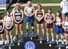 Kyla Sawvell and Cooper McLaughlin are pictured here with the shot put placers.